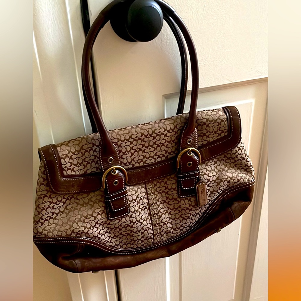 Authentic vintage classic coach handbag with suede bottom.